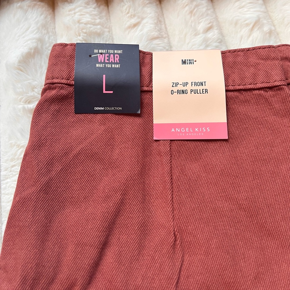 Angel kiss mini skirt - size large. NWT!!